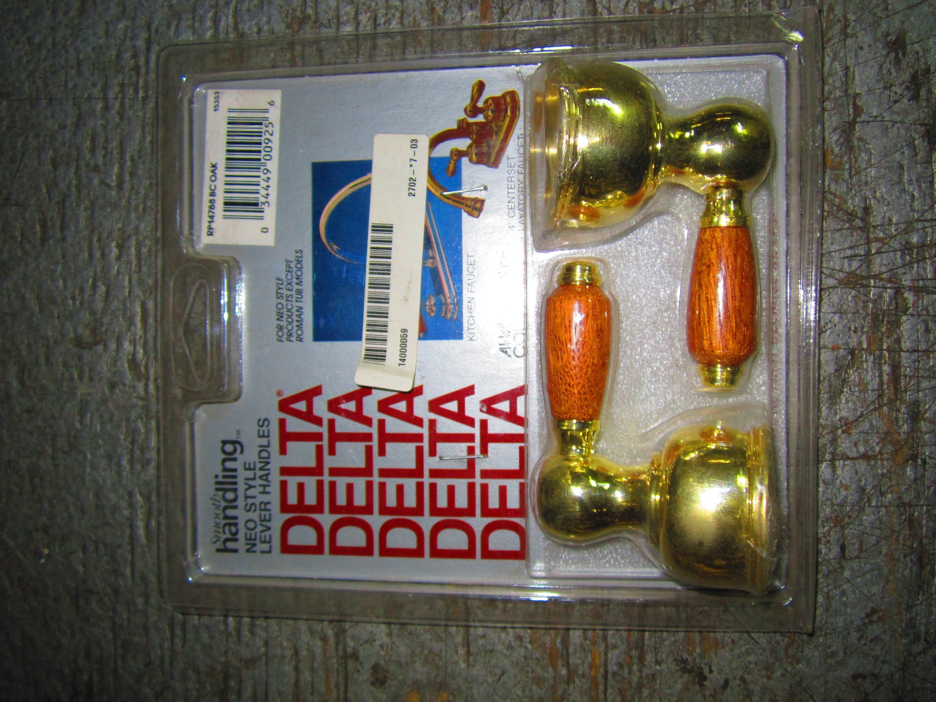 Delta RP14788PBOAK Lever Handles In Oak