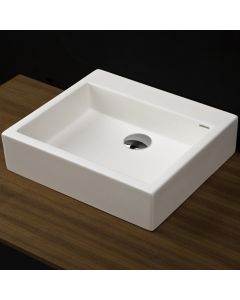 Lacava 5106-001M Luce Vessel lavatory made of solid surface, with an overflow.Finished back. Available with no faucet holes, one or three in 8" spread.W: 22” D: 15”H: 6 1/8” in Matte White